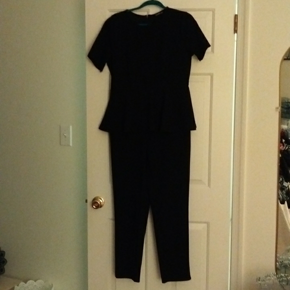 XL Black Zip Peplum jumpsuit. - Picture 7 of 8